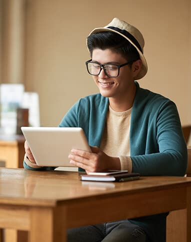 Student studying with tablet